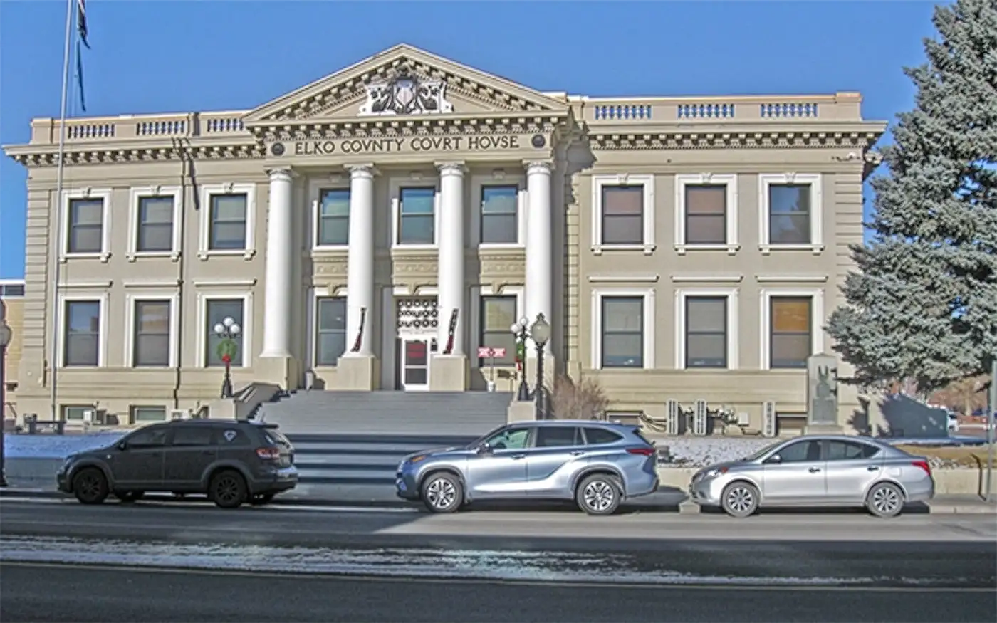 Street view of Elko County Courthouse on a clear winter day.